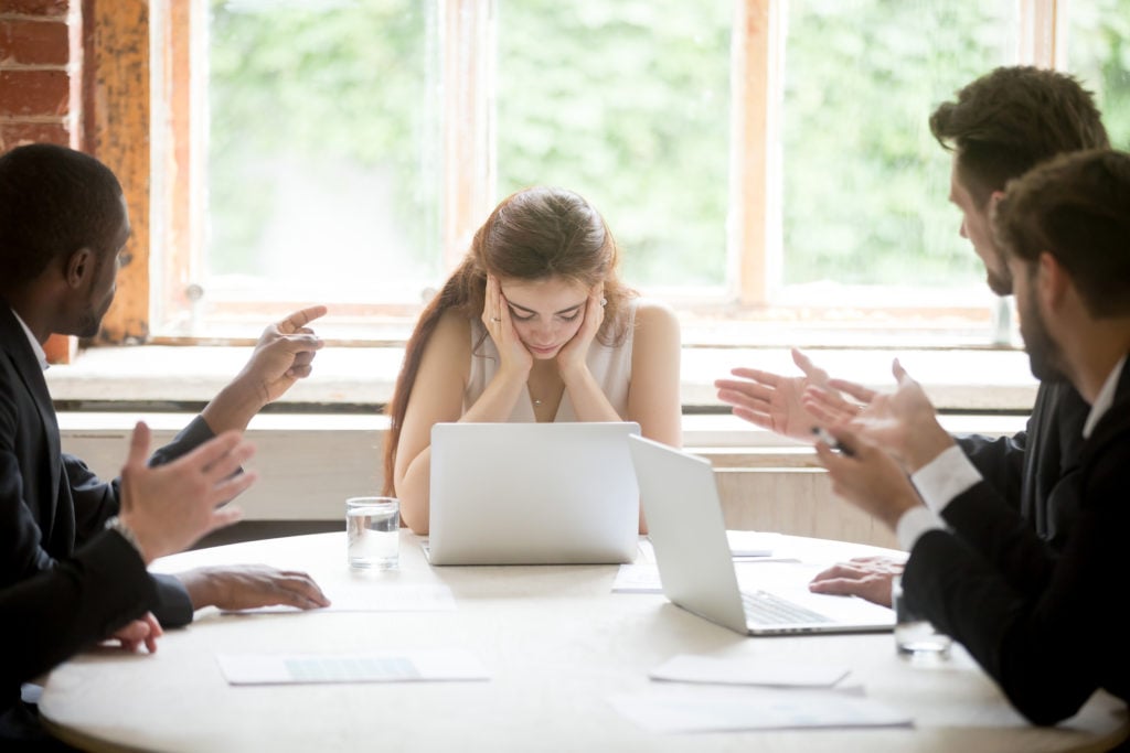 Employee feeling overwhelmed in a meeting